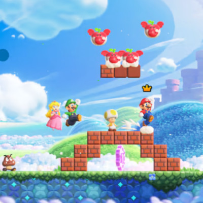 Captura de ecran din jocul Super Mario Bros Wonder cu Mario, Luigi si Peach sarind peste obstacole.